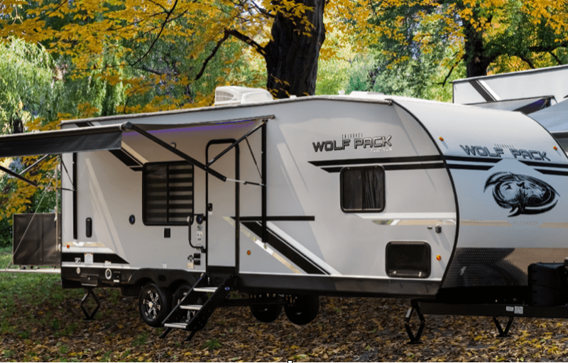 Wolf Pack Toy Hauler in woods